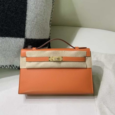 Hermès Kelly Pochette in Orange H Swift leather with gold hardware